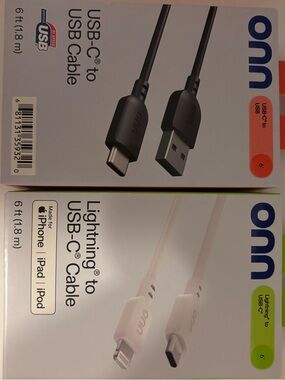On Running USB-C and Lightning Cables — White with Green and Orange Accents